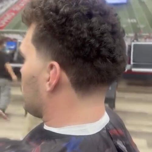 Curly fade at Alfred's Barbershop