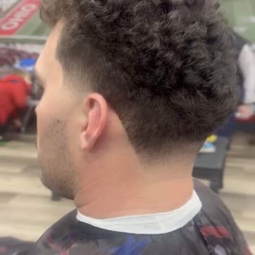 Curly taper at Alfred's Barbershop
