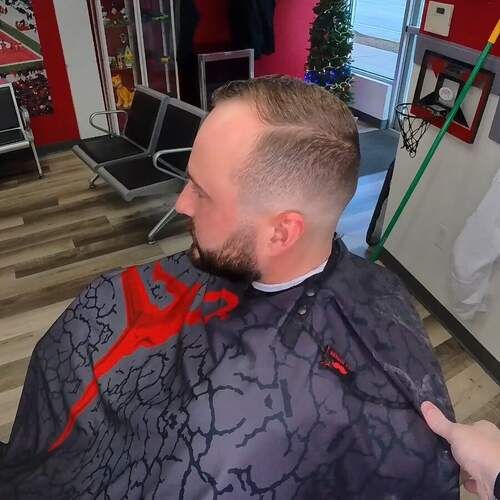 Fade haircut at Alfred's Barbershop